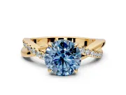 Crossover Engagement Ring Setting for Fancy Blue Round Cut Center with Pave and Plain Strands and Prong Head in Yellow Gold