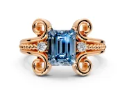 Solitaire Engagement Ring Setting for Fancy Blue Emerald Cut Center with Twisted Band and Scroll Prong Head in Rose Gold