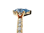 Solitaire Engagement Ring Setting for Fancy Blue Pear-Shaped Center with Shared-Prong Accents and Prong Head in Yellow Gold