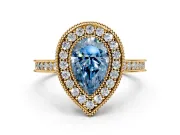 Halo Engagement Ring Setting for Fancy Blue Pear-Shaped Center with Milgrain Pave Band and Bezel Head in Yellow Gold