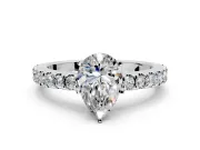 Solitaire Engagement Ring Setting for Pear-Shaped Center with Single Row Accent Band and Prong Head in Platinum