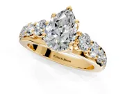 Solitaire Engagement Ring Setting for Pear-Shaped Center with Graduated Shared Prongs and Prong Head in Yellow Gold