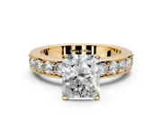 Solitaire Engagement Ring Setting for Radiant Cut Center with Channel-Set Accents and Prong Head in Yellow Gold