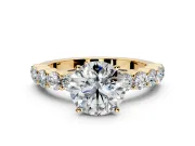 Shared-Prong Engagement Ring Setting for Round Cut Center with Graduated Accents and Prong Head in Yellow Gold
