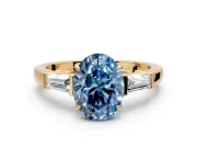 3 Stone Engagement Ring Setting for Fancy Blue Oval Center with Baguette Accents and Prong Head in Yellow Gold