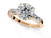 3 Stone Engagement Ring Setting for Round Cut Center with Tapered Baguettes, Plain Band and Prong Head in Rose Gold
