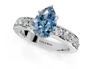 Solitaire Engagement Ring Setting for Fancy Blue Pear-Shaped Center with Channel-Set Accents and Prong Head in White Gold