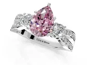 3 Stone Engagement Ring Setting for Fancy Pink Pear-Shaped Center with Pave Twist Band and Prong Head in Platinum