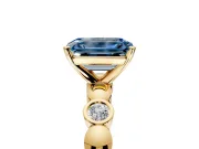 Solitaire Engagement Ring Setting for Fancy Blue Emerald Cut Center with Beaded Bezel Station Band and Prong Head in Yellow Gold