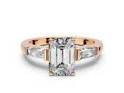3 Stone Engagement Ring Setting for Emerald Cut Center with Tapered Baguettes, Plain Band and Prong Head in Rose Gold