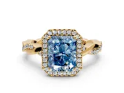 Halo Engagement Ring Setting for Fancy Blue Radiant Cut Center with Pave and Plain Twist Band and Prong Head in Yellow Gold