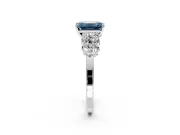 Cluster Engagement Ring Setting for Fancy Blue Emerald Cut Center with 2-Row Shoulder Clusters and Prong Head in Sterling Silver