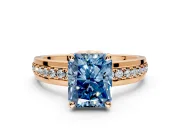 Solitaire Engagement Ring Setting for Fancy Blue Radiant Cut Center with Raised Channel Band and Prong Head in Rose Gold