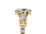 3 Stone Engagement Ring Setting for Oval Center with Round Cut Side Accents and Prong Head in Yellow Gold