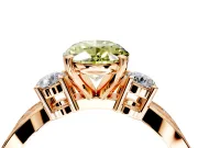3 Stone Engagement Ring Setting for Fancy Yellow Oval Center with Pave Twist Band and Prong Head in Rose Gold