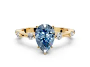 Solitaire Engagement Ring Setting for Fancy Blue Pear-Shaped Center with Bezel Station Band and Prong Head in Yellow Gold