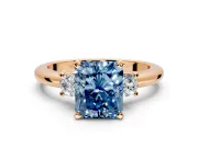 3 Stone Engagement Ring Setting for Fancy Blue Radiant Cut Center with Wide Plain Band and Prong Head in Rose Gold