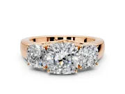 3 Stone Engagement Ring Setting for Cushion Cut Center with Raised Basket Heads and Prong Head in Rose Gold