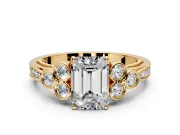 Cluster Engagement Ring Setting for Emerald Cut Center with Bezel Accent Clusters and Prong Head in Yellow Gold