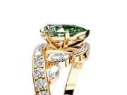 Solitaire Engagement Ring Setting for Fancy Green Pear-Shaped Center with Pave Bypass Twist Band and Prong Head in Yellow Gold