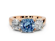 3 Stone Engagement Ring Setting for Fancy Blue Cushion Cut Center with Raised Basket Heads and Prong Head in Rose Gold