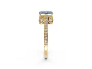 Cathedral Engagement Ring Setting for Fancy Blue Radiant Cut Center with Antique-Style Pave Band and Prong Head in Yellow Gold