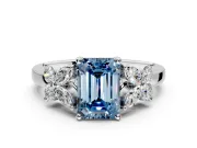 Floral Engagement Ring Setting for Fancy Blue Emerald Cut Center with Marquise Cluster Shoulders and Prong Head in Platinum