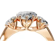 3 Stone Engagement Ring Setting for Heart-Shaped Center with Raised Basket Heads and Prong Head in Rose Gold