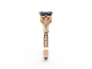 Solitaire Engagement Ring Setting for Fancy Blue Emerald Cut Center with Marquise and Bezel Accents and Prong Head in Rose Gold