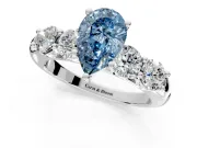 5 Stone Engagement Ring Setting for Fancy Blue Pear-Shaped Center with Graduated Accents and Prong Head in White Gold