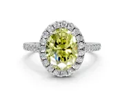 Halo Engagement Ring Setting for Fancy Yellow Oval Center with Narrowing Pave Band and Prong Head in White Gold