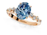 Cluster Engagement Ring Setting for Fancy Blue Oval Center with Round Cut Accent Band and Prong Head in Rose Gold