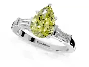 3 Stone Engagement Ring Setting for Fancy Yellow Pear-Shaped Center with Channel Baguette Accents and Prong Head in White Gold