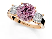 3 Stone Engagement Ring Setting for Fancy Pink Round Cut Center with Matching Side Accents and Prong Head in Rose Gold
