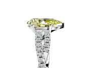 Solitaire Engagement Ring Setting for Fancy Yellow Pear-Shaped Center with Twisted Pave Split Shank and Prong Head in White Gold