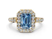 Halo Engagement Ring Setting for Fancy Blue Emerald Cut Center with Heart-Shaped Openwork, Pave Band and Prong Head in Yellow Gold