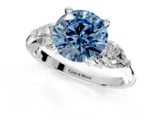 3 Stone Engagement Ring Setting for Fancy Blue Round Cut Center with Large Pear-Shaped Accents and Prong Head in Sterling Silver
