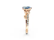 Leaf Motif Engagement Ring Setting for Fancy Blue Pear-Shaped Center with Pave Band and Prong Head in Rose Gold