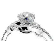 Solitaire Engagement Ring Setting for Pear-Shaped Center with Pave Bypass Twist Band and Prong Head in Platinum