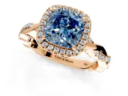 Halo Engagement Ring Setting for Fancy Blue Cushion Cut Center with Pave and Plain Twist Band and Prong Head in Rose Gold