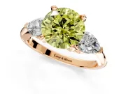 3 Stone Engagement Ring Setting for Fancy Yellow Round Cut Center with Large Pear-Shaped Accents and Prong Head in Rose Gold