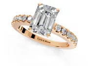 Solitaire Engagement Ring Setting for Emerald Cut Center with Single Row Accent Band and Prong Head in Rose Gold