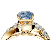 Halo Engagement Ring Setting for Fancy Blue Cushion Cut Center with Marquise and Pave Bypass Band and Prong Head in Yellow Gold