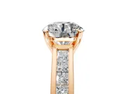 Solitaire Engagement Ring Setting for Round Cut Center with Princess Cut Channel Band and Prong Head in Rose Gold