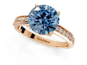 Solitaire Engagement Ring Setting for Fancy Blue Round Cut Center with Channel-Set Accent Band and Prong Head in Rose Gold
