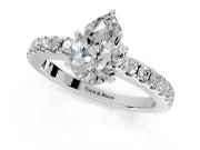 Solitaire Engagement Ring Setting for Pear-Shaped Center with Single Row Accent Band and Prong Head in Platinum