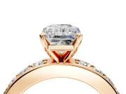 Solitaire Engagement Ring Setting for Radiant Cut Center with Channel-Set Accents and Prong Head in Rose Gold