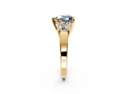 3 Stone Engagement Ring Setting for Fancy Blue Heart-Shaped Center with Matching Side Accents and Prong Head in Yellow Gold