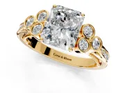 Cluster Engagement Ring Setting for Radiant Cut Center with Bezel Accent Clusters and Prong Head in Yellow Gold