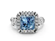 Halo Engagement Ring Setting for Fancy Blue Princess Cut Center with Open Scroll Shoulders and Prong Head in White Gold